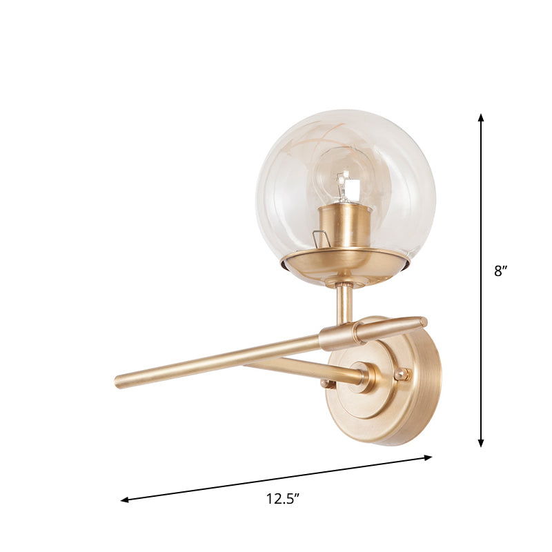 Brass Globe Wall Light Contemporary 1 Light Hand Blown Glass Sconce Light with Crossed Arm
