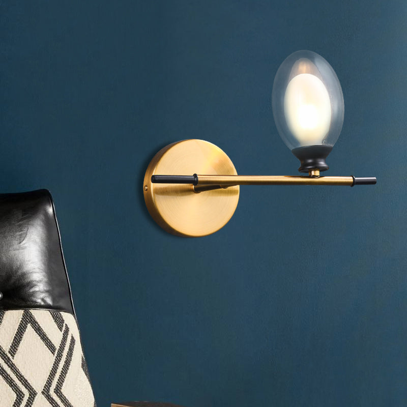 Clear/Amber Glass Egg Shape Wall Light Fixture Minimalist 1 Light Brass Sconce with Horizontal Arm - Clearhalo - 'Cast Iron' - 'Glass' - 'Industrial' - 'Modern wall lights' - 'Modern' - 'Tiffany' - 'Traditional wall lights' - 'Wall Lamps & Sconces' - 'Wall Lights' - Lighting' - 275243