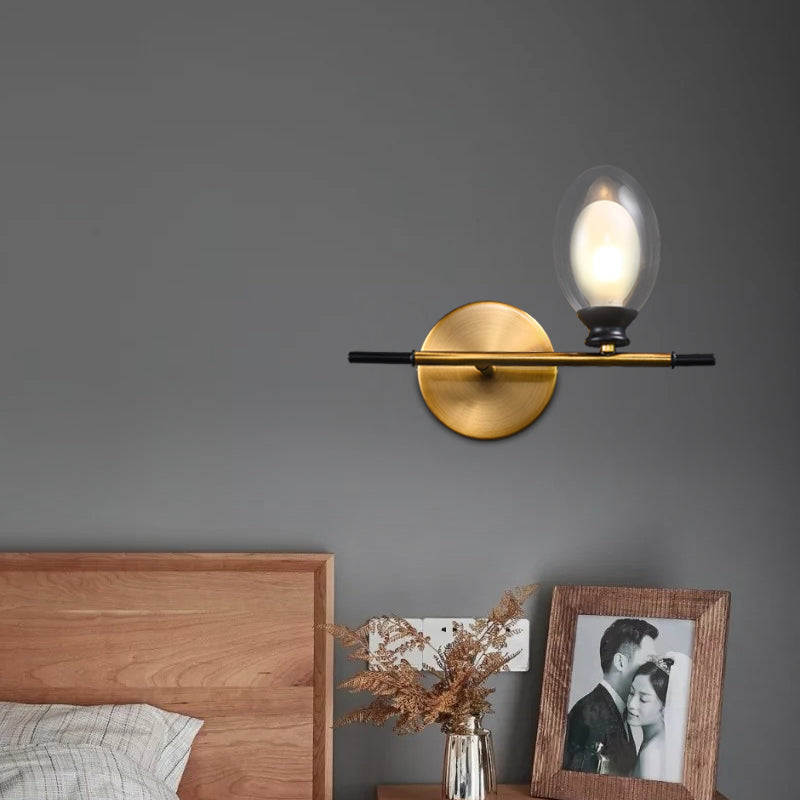 Clear/Amber Glass Egg Shape Wall Light Fixture Minimalist 1 Light Brass Sconce with Horizontal Arm Clearhalo 'Cast Iron' 'Glass' 'Industrial' 'Modern wall lights' 'Modern' 'Tiffany' 'Traditional wall lights' 'Wall Lamps & Sconces' 'Wall Lights' Lighting' 275244