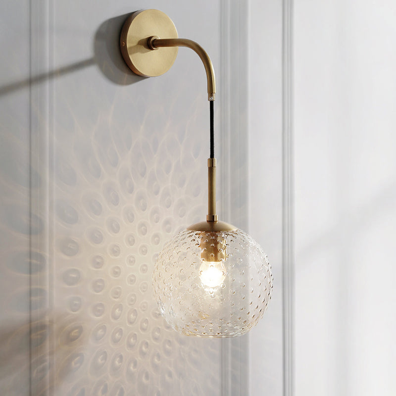 Pink/Yellow/Blue Glass Globe Wall Mounted Lamp Retro 1 Bulb Armed Sconce Light in Brass Finish Clear Clearhalo 'Cast Iron' 'Glass' 'Industrial' 'Modern wall lights' 'Modern' 'Tiffany' 'Traditional wall lights' 'Wall Lamps & Sconces' 'Wall Lights' Lighting' 275393