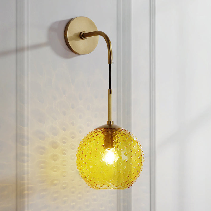 Pink/Yellow/Blue Glass Globe Wall Mounted Lamp Retro 1 Bulb Armed Sconce Light in Brass Finish Yellow Clearhalo 'Cast Iron' 'Glass' 'Industrial' 'Modern wall lights' 'Modern' 'Tiffany' 'Traditional wall lights' 'Wall Lamps & Sconces' 'Wall Lights' Lighting' 275416