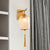 Prismatic Glass Lantern Wall Lamp Chinese Style 1-Light Brass Sconce Light Fixture with Tassel Knot Brass Clearhalo 'Cast Iron' 'Glass' 'Industrial' 'Modern wall lights' 'Modern' 'Tiffany' 'Traditional wall lights' 'Wall Lamps & Sconces' 'Wall Lights' Lighting' 275450