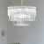 3 Tiers Clear Crystal Rod Pendant Chandelier Modernism 12 Lights Gold Suspension Light Clear Clearhalo 'Ceiling Lights' 'Chandeliers' 'Clear' 'Industrial' 'Modern Chandeliers' 'Modern' 'Tiffany' 'Traditional Chandeliers' Lighting' 279454