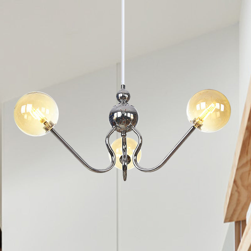 Industrial 3 Heads Hanging Chandelier Lamp with Amber/Clear Glass Shade Black/Chrome Finish Orbit Ceiling Lighting Clearhalo 'Cast Iron' 'Ceiling Lights' 'Chandeliers' 'Industrial Chandeliers' 'Industrial' 'Metal' 'Middle Century Chandeliers' 'Rustic Chandeliers' 'Tiffany' Lighting' 281229
