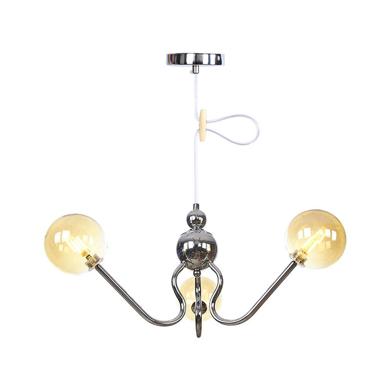 Industrial 3 Heads Hanging Chandelier Lamp with Amber/Clear Glass Shade Black/Chrome Finish Orbit Ceiling Lighting Clearhalo 'Cast Iron' 'Ceiling Lights' 'Chandeliers' 'Industrial Chandeliers' 'Industrial' 'Metal' 'Middle Century Chandeliers' 'Rustic Chandeliers' 'Tiffany' Lighting' 281231