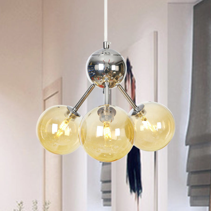 13"/27.5"/34" W Orbit Shade Hanging Chandelier Light Industrial Style Amber/Clear/Smoke Gray Glass 3/9/12 Lights Warehouse Pendant Lamp 3 Amber 13" Clearhalo 'Ceiling Lights' 'Chandeliers' 'Clear' 'Glass shade' 'Glass' 'Industrial Chandeliers' 'Industrial' 'Middle Century Chandeliers' 'Modern' 'Tiffany' 'Traditional Chandeliers' Lighting' 282072