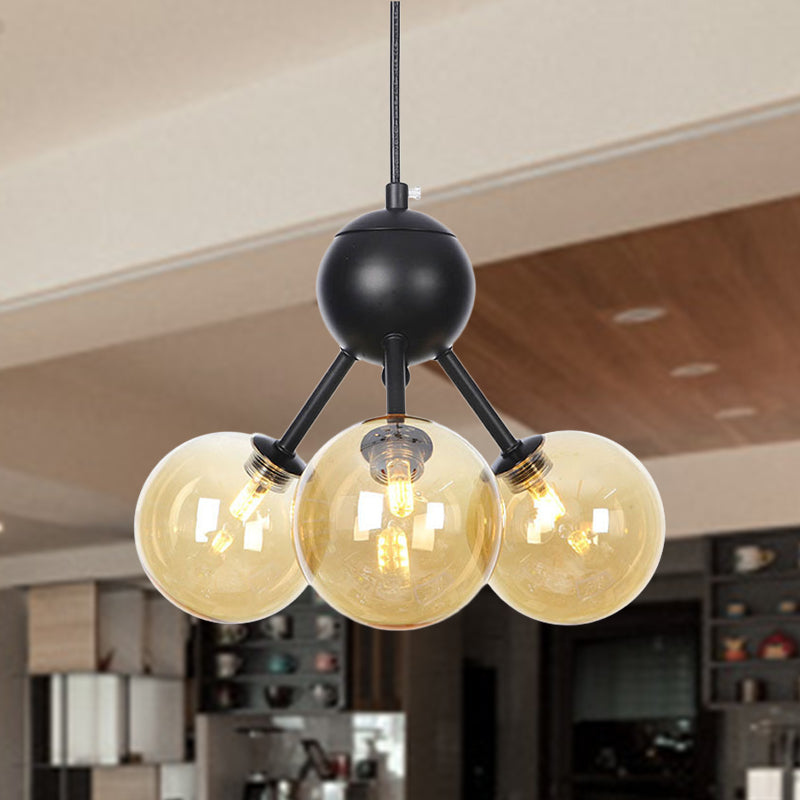 Orb Living Room Chandelier Lamp Amber/Clear/Smoke Gray Glass 3/9/12 Lights Industrial Ceiling Light with Sputnik Design, 13"/27.5"/34" Wide 3 Amber 13" Clearhalo 'Cast Iron' 'Ceiling Lights' 'Chandeliers' 'Clear' 'Industrial Chandeliers' 'Industrial' 'Metal' 'Middle Century Chandeliers' 'Modern' 'Rustic Chandeliers' 'Tiffany' 'Traditional Chandeliers' Lighting' 282351