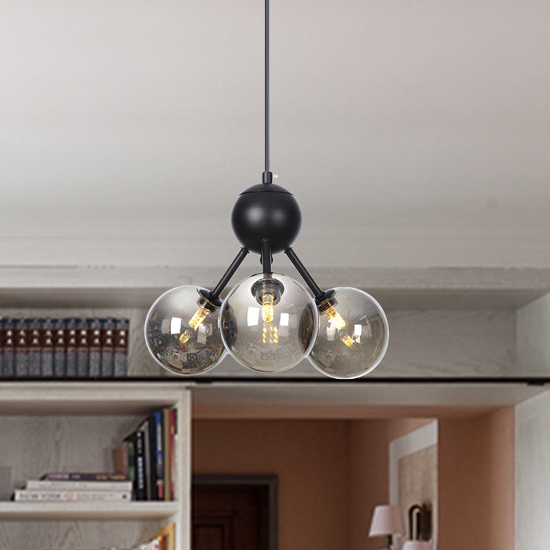 Orb Living Room Chandelier Lamp Amber/Clear/Smoke Gray Glass 3/9/12 Lights Industrial Ceiling Light with Sputnik Design, 13"/27.5"/34" Wide Clearhalo 'Cast Iron' 'Ceiling Lights' 'Chandeliers' 'Clear' 'Industrial Chandeliers' 'Industrial' 'Metal' 'Middle Century Chandeliers' 'Modern' 'Rustic Chandeliers' 'Tiffany' 'Traditional Chandeliers' Lighting' 282357