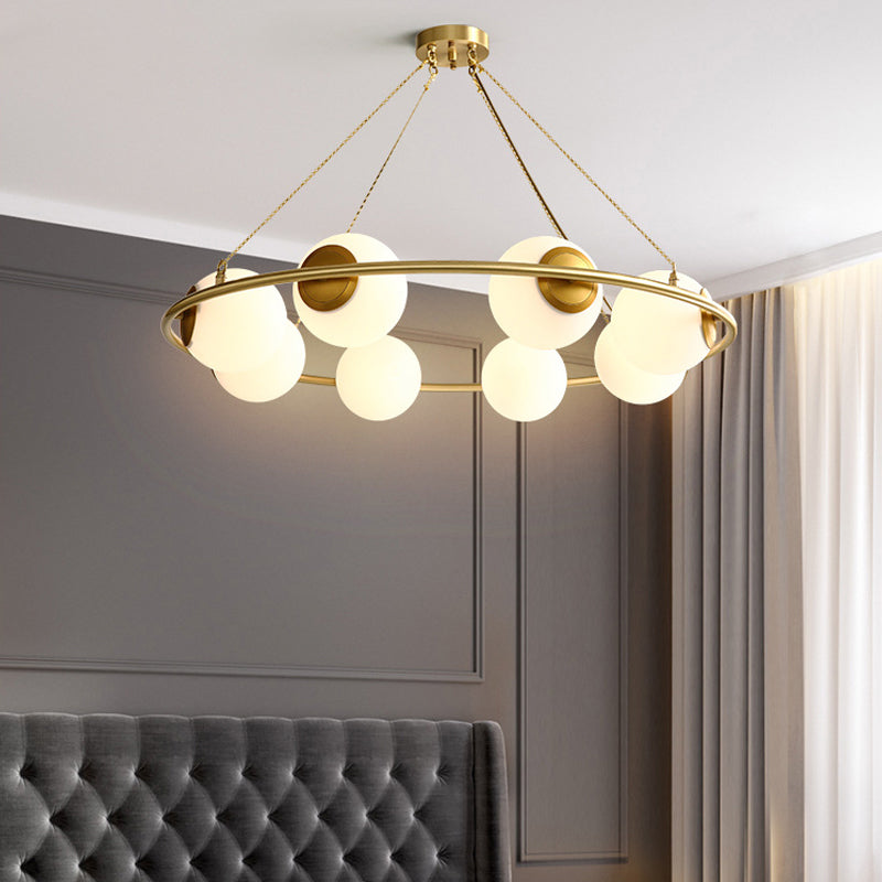 Circular Chandelier Light Postmodern Metal 6/8 Lights Brass Hanging Lamp Kit with Globe Frosted Glass Shade Clearhalo 'Ceiling Lights' 'Chandeliers' 'Glass shade' 'Glass' 'Island Lights' 'Modern Chandeliers' 'Modern' 'Pendant Lights' Lighting' 288289