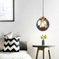 Contemporary Globe Hanging Light Amber/Clear/Smoke Gray Glass 1 Head Bedroom Pendant Light Fixture Clearhalo 'Ceiling Lights' 'Modern Pendants' 'Modern' 'Pendant Lights' 'Pendants' Lighting' 288973