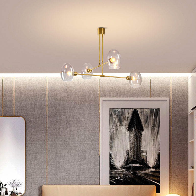 Clear Glass Oval Pendant Chandelier Modernist 4 Lights Brass Hanging Ceiling Lamp for Bedroom Clearhalo 'Ceiling Lights' 'Chandeliers' 'Clear' 'Glass shade' 'Glass' 'Industrial' 'Modern Chandeliers' 'Modern' 'Tiffany' 'Traditional Chandeliers' Lighting' 303500