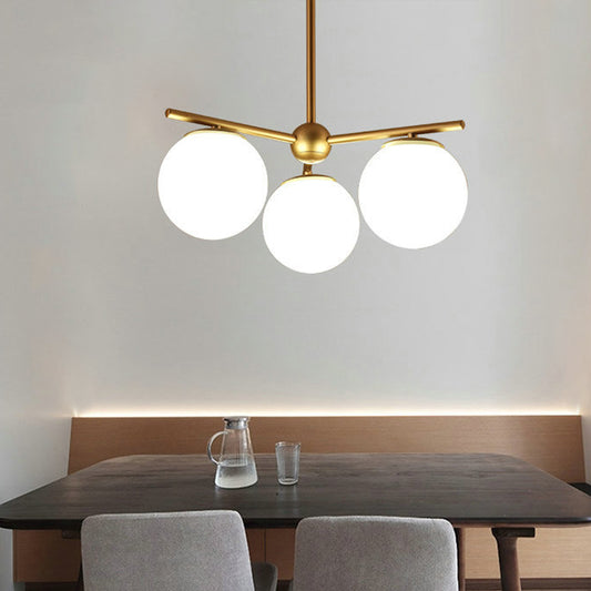 Globe Hanging Chandelier Modern White Frosted Glass 3 Lights Gold Ceiling Pendant Lamp for Bedroom Gold Clearhalo 'Ceiling Lights' 'Chandeliers' 'Glass shade' 'Glass' 'Island Lights' 'Modern Chandeliers' 'Modern' Lighting' 303511