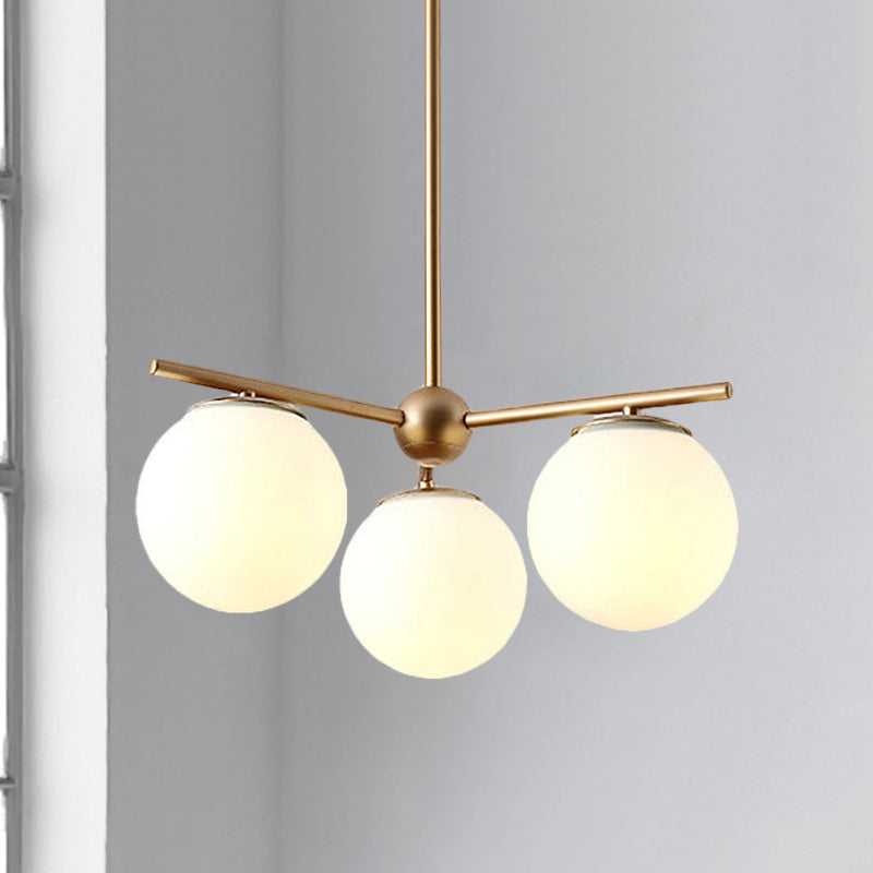 Globe Hanging Chandelier Modern White Frosted Glass 3 Lights Gold Ceiling Pendant Lamp for Bedroom Clearhalo 'Ceiling Lights' 'Chandeliers' 'Glass shade' 'Glass' 'Island Lights' 'Modern Chandeliers' 'Modern' Lighting' 303512