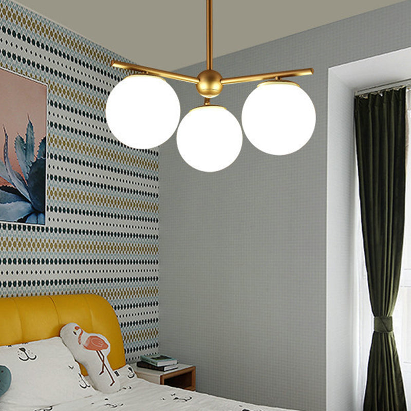 Globe Hanging Chandelier Modern White Frosted Glass 3 Lights Gold Ceiling Pendant Lamp for Bedroom Clearhalo 'Ceiling Lights' 'Chandeliers' 'Glass shade' 'Glass' 'Island Lights' 'Modern Chandeliers' 'Modern' Lighting' 303513