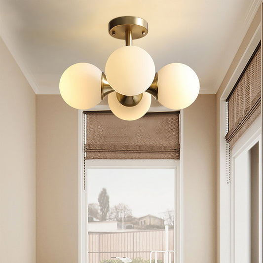 Gold Ball Semi Flush Light Contemporary 4 Heads Milky Glass Close to Ceiling Lamp Clearhalo 'Ceiling Lights' 'Chandeliers' 'Close To Ceiling Lights' 'Close to ceiling' 'Glass shade' 'Glass' 'Semi-flushmount' Lighting' 303705