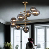 Smoke Gray Glass Semi Flush Light Globe Shaped Minimalist 6/9 Lights Semi Flush Mount in Brass 9 Brass Clearhalo 'Ceiling Lights' 'Close To Ceiling Lights' 'Close to ceiling' 'Glass shade' 'Glass' 'Semi-flushmount' Lighting' 311212