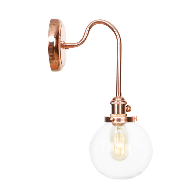 Vintage Globe Wall Lighting 1 Light Clear/Amber Glass Sconce in Copper with Curved Arm Clearhalo 'Art deco wall lights' 'Cast Iron' 'Glass' 'Industrial wall lights' 'Industrial' 'Middle century wall lights' 'Modern' 'Rustic wall lights' 'Tiffany' 'Traditional wall lights' 'Wall Lamps & Sconces' 'Wall Lights' Lighting' 315398