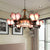 7/9 Lights Living Room Chandelier Lamp Baroque Black Pendant Light Fixture with Floral Pink/Yellow/Blue Glass Shade 7 Pink Clearhalo 'Ceiling Lights' 'Chandeliers' 'Industrial' 'Middle Century Chandeliers' 'Tiffany Chandeliers' 'Tiffany close to ceiling' 'Tiffany' Lighting' 318445