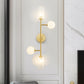 Brass Armed Sconce Modernist 4 Heads Metal Wall Mounted Light Fixture for Dining Room Clearhalo 'Cast Iron' 'Glass' 'Industrial' 'Modern wall lights' 'Modern' 'Tiffany' 'Traditional wall lights' 'Wall Lamps & Sconces' 'Wall Lights' Lighting' 324161