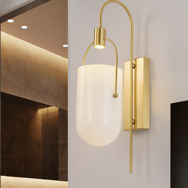 Pill Capsule Sconce Light Modernism Milky Glass 1 Bulb Wall Mounted Lighting in Brass Brass Clearhalo 'Cast Iron' 'Glass' 'Industrial' 'Modern wall lights' 'Modern' 'Tiffany' 'Traditional wall lights' 'Wall Lamps & Sconces' 'Wall Lights' Lighting' 324185