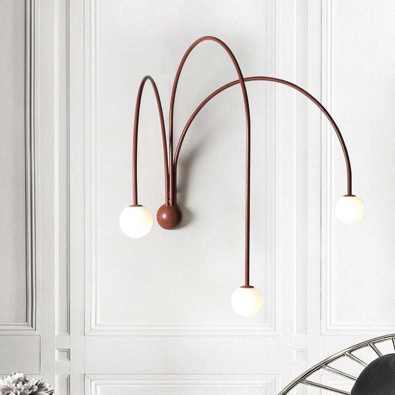 3 Heads Curved Arm Sconce Light Minimalist Metal Wall Mounted Lighting in Red for Bedside Clearhalo 'Cast Iron' 'Glass' 'Industrial' 'Modern wall lights' 'Modern' 'Tiffany' 'Traditional wall lights' 'Wall Lamps & Sconces' 'Wall Lights' Lighting' 324201