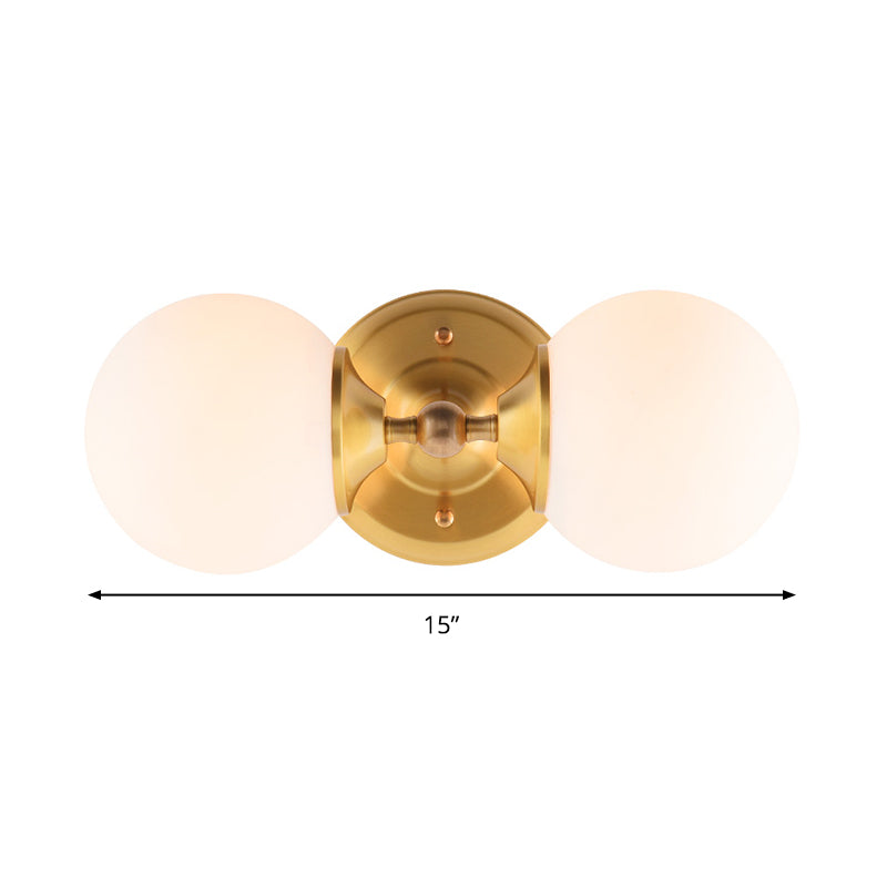 Spherical Sconce Contemporary Milky Glass 2 Heads Wall Mount Light Fixture in Brass Clearhalo 'Cast Iron' 'Glass' 'Industrial' 'Modern wall lights' 'Modern' 'Tiffany' 'Traditional wall lights' 'Wall Lamps & Sconces' 'Wall Lights' Lighting' 324229