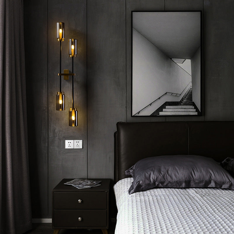 Modernist Cylinder Sconce Light Smoke Gray Glass 4 Heads Bedroom Wall Mounted Lamp Clearhalo 'Cast Iron' 'Glass' 'Industrial' 'Modern wall lights' 'Modern' 'Tiffany' 'Traditional wall lights' 'Wall Lamps & Sconces' 'Wall Lights' Lighting' 324232