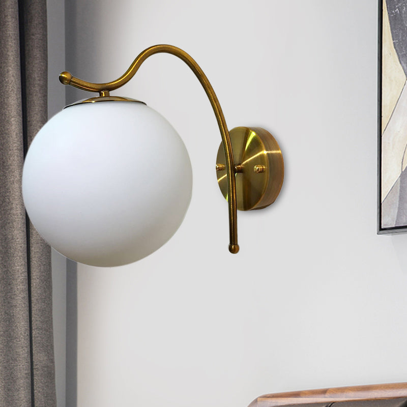 Ball Wall Lamp Modern White Glass 1 Head Gold Sconce Light Fixture with Metal Curved Arm - Clearhalo - 'Cast Iron' - 'Glass' - 'Industrial' - 'Modern wall lights' - 'Modern' - 'Tiffany' - 'Traditional wall lights' - 'Wall Lamps & Sconces' - 'Wall Lights' - Lighting' - 324242
