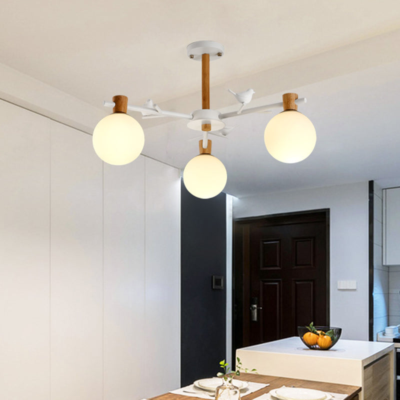 Contemporary Globe Chandelier Light White Glass 3 Bulbs Bedroom Suspended Lighting Fixture with Bird Clearhalo 'Ceiling Lights' 'Chandeliers' 'Glass shade' 'Glass' Lighting' 324351