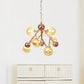 Spherical Living Room Chandelier Light Amber Glass 9 Heads Modern Ceiling Suspension Lamp Clearhalo 'Ceiling Lights' 'Chandeliers' 'Glass shade' 'Glass' 'Modern Chandeliers' 'Modern' Lighting' 325209