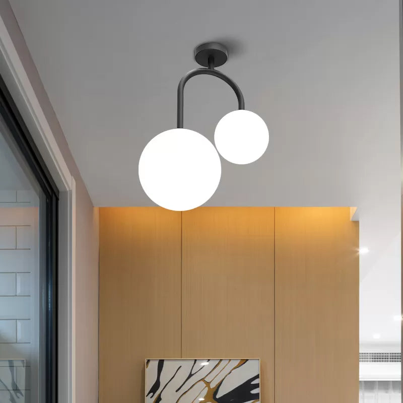 2 Heads Spherical Semi Flush Mount Modernist Milk Glass Ceiling Light Fixture in Black Clearhalo 'Ceiling Lights' 'Close To Ceiling Lights' 'Close to ceiling' Lighting' 325486