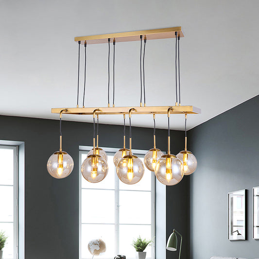 Modern 8 Heads Island Lamp Brass Ball Hanging Pendant Light with Clear Glass Shade Clearhalo 'Ceiling Lights' 'Close To Ceiling Lights' 'Glass shade' 'Glass' 'Island Lights' Lighting' 325552