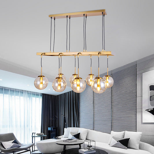 Modern 8 Heads Island Lamp Brass Ball Hanging Pendant Light with Clear Glass Shade Clearhalo 'Ceiling Lights' 'Close To Ceiling Lights' 'Glass shade' 'Glass' 'Island Lights' Lighting' 325553