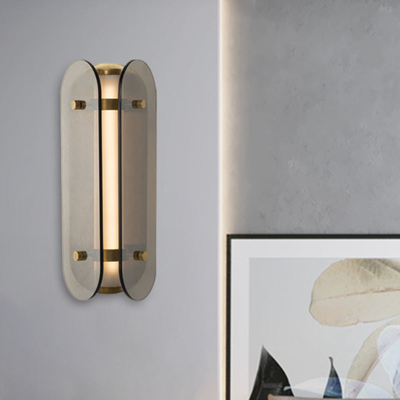 Pill Capsule Bedside Sconce Minimalism Smoke Gray Glass 1 Bulb Wall Mounted Lamp Smoke Gray Clearhalo 'Cast Iron' 'Glass' 'Industrial' 'Modern wall lights' 'Modern' 'Tiffany' 'Traditional wall lights' 'Wall Lamps & Sconces' 'Wall Lights' Lighting' 325649