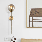 Modernist Round Wall Lamp Clear/Amber/Smoke Gray Glass 1 Bulb Bedside Sconce Light Fixture with Metal Pencil Arm - Amber - Clearhalo - 'Cast Iron' - 'Glass' - 'Industrial' - 'Modern wall lights' - 'Modern' - 'Tiffany' - 'Traditional wall lights' - 'Wall Lamps & Sconces' - 'Wall Lights' - Lighting' - 325673