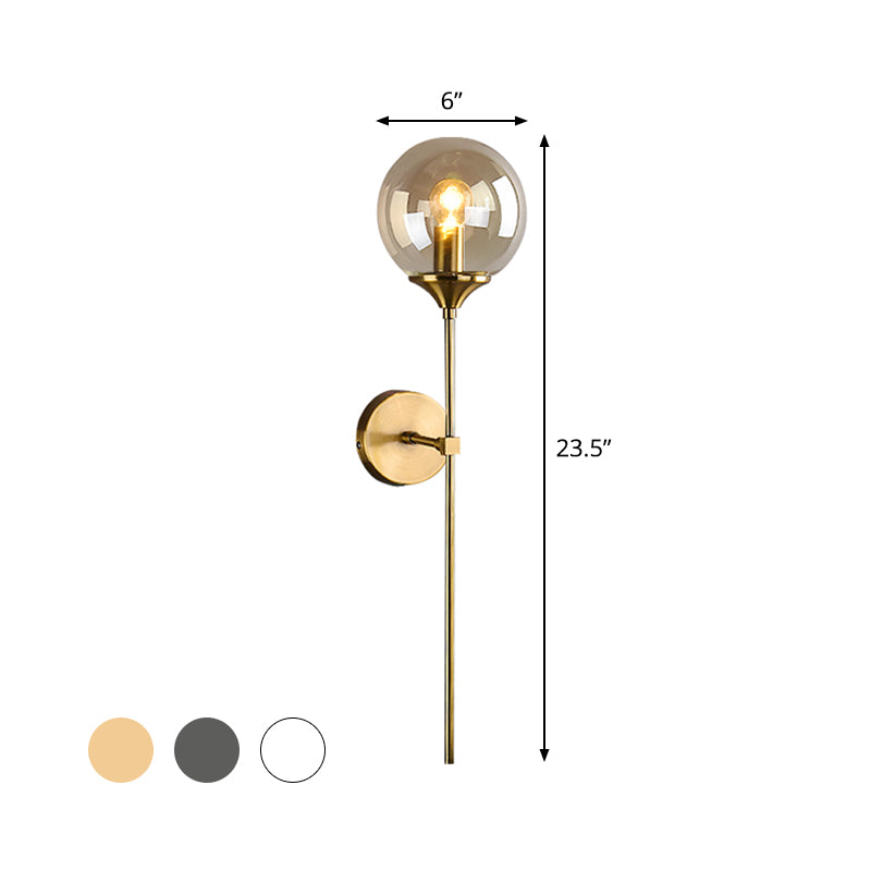 Modernist Round Wall Lamp Clear/Amber/Smoke Gray Glass 1 Bulb Bedside Sconce Light Fixture with Metal Pencil Arm - Clearhalo - 'Cast Iron' - 'Glass' - 'Industrial' - 'Modern wall lights' - 'Modern' - 'Tiffany' - 'Traditional wall lights' - 'Wall Lamps & Sconces' - 'Wall Lights' - Lighting' - 325677