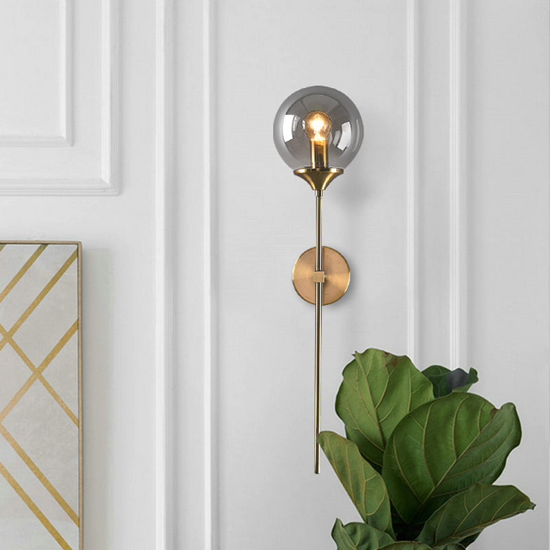 Modernist Round Wall Lamp Clear/Amber/Smoke Gray Glass 1 Bulb Bedside Sconce Light Fixture with Metal Pencil Arm - Smoke Gray - Clearhalo - 'Cast Iron' - 'Glass' - 'Industrial' - 'Modern wall lights' - 'Modern' - 'Tiffany' - 'Traditional wall lights' - 'Wall Lamps & Sconces' - 'Wall Lights' - Lighting' - 325678