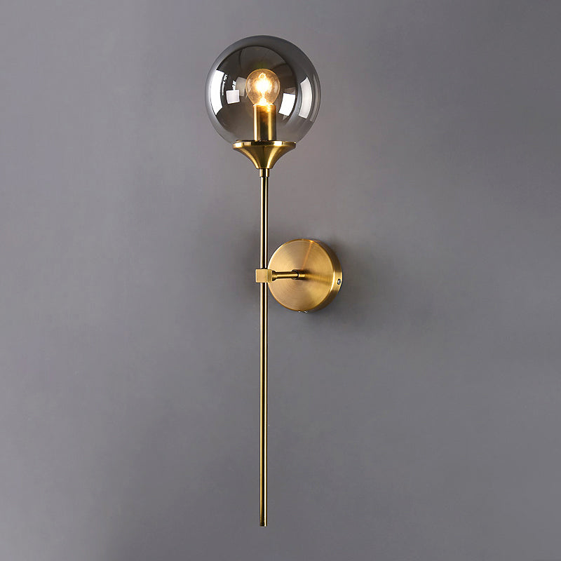Modernist Round Wall Lamp Clear/Amber/Smoke Gray Glass 1 Bulb Bedside Sconce Light Fixture with Metal Pencil Arm - Clearhalo - 'Cast Iron' - 'Glass' - 'Industrial' - 'Modern wall lights' - 'Modern' - 'Tiffany' - 'Traditional wall lights' - 'Wall Lamps & Sconces' - 'Wall Lights' - Lighting' - 325680