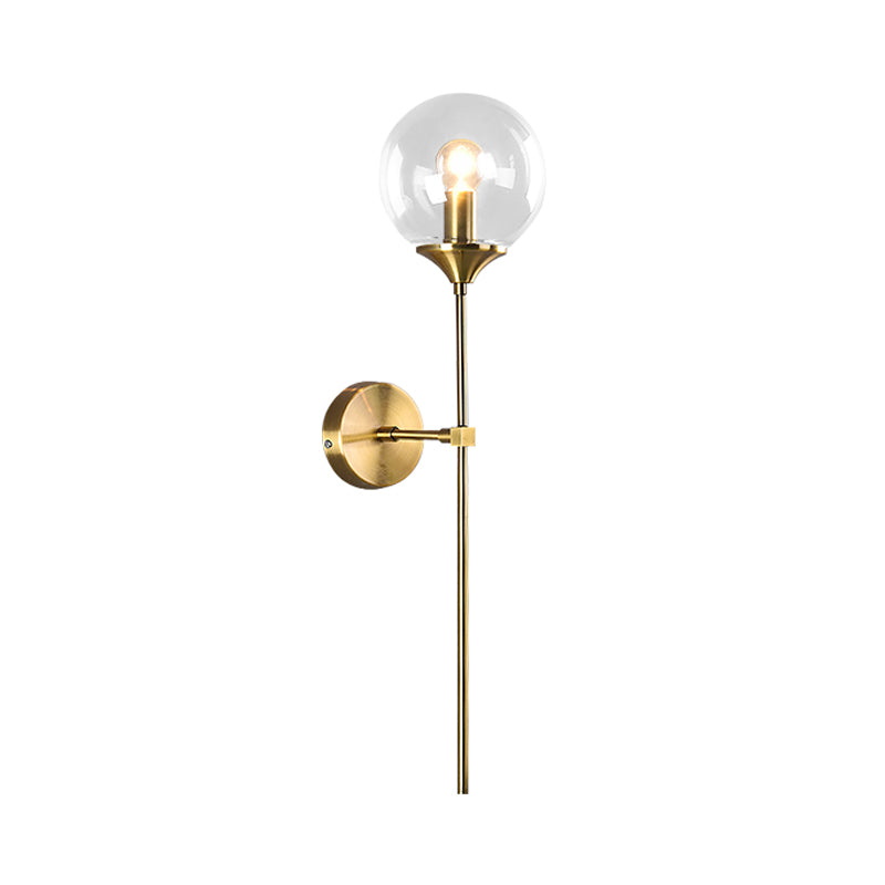 Modernist Round Wall Lamp Clear/Amber/Smoke Gray Glass 1 Bulb Bedside Sconce Light Fixture with Metal Pencil Arm - Clearhalo - 'Cast Iron' - 'Glass' - 'Industrial' - 'Modern wall lights' - 'Modern' - 'Tiffany' - 'Traditional wall lights' - 'Wall Lamps & Sconces' - 'Wall Lights' - Lighting' - 325685