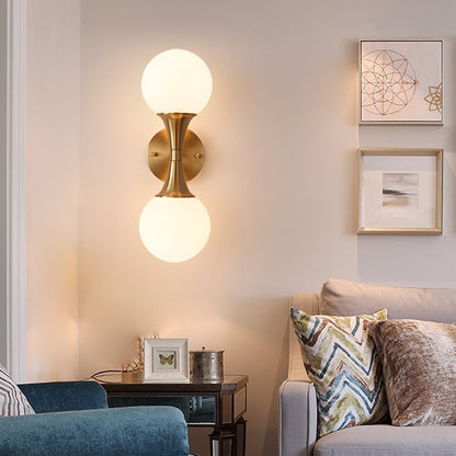 2 Bulbs Bathroom Vanity Light Modernism Brass Wall Mounted Lamp with Orb Milky Glass Shade Brass Clearhalo 'Cast Iron' 'Glass' 'Industrial' 'Modern wall lights' 'Modern' 'Tiffany' 'Traditional wall lights' 'Wall Lamps & Sconces' 'Wall Lights' Lighting' 325927