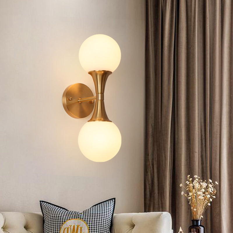 2 Bulbs Bathroom Vanity Light Modernism Brass Wall Mounted Lamp with Orb Milky Glass Shade Clearhalo 'Cast Iron' 'Glass' 'Industrial' 'Modern wall lights' 'Modern' 'Tiffany' 'Traditional wall lights' 'Wall Lamps & Sconces' 'Wall Lights' Lighting' 325928