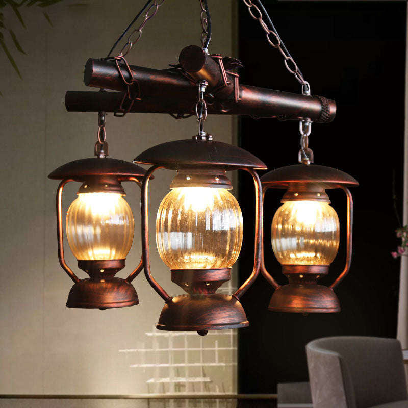 Red Brown 3 Lights Chandelier Light Fixture Antique Kerosene Pendant Lighting for Dining Room Red Brown Clearhalo 'Cast Iron' 'Ceiling Lights' 'Chandeliers' 'Industrial Chandeliers' 'Industrial' 'Metal' 'Middle Century Chandeliers' 'Rustic Chandeliers' 'Tiffany' Lighting' 326895
