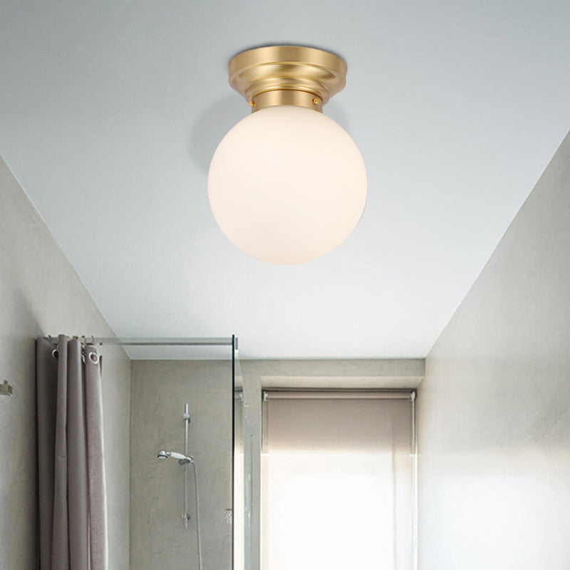 1 Bulb Brass/Black Finish Close to Ceiling Light with Frosted Globe Glass Shade Minimalist Semi-Flushmount Light Brass Clearhalo 'Ceiling Lights' 'Close To Ceiling Lights' 'Close to ceiling' 'Flush mount' Lighting' 330690