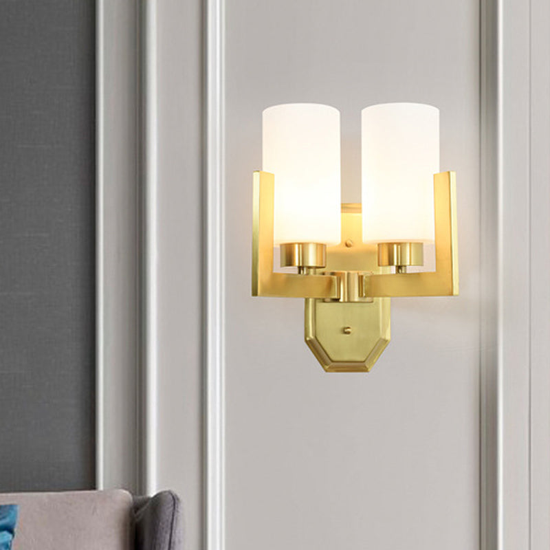 Modernist 2 Heads Sconce Light Gold Cylinder Wall Mounted Lamp with Milk Glass Shade Gold Clearhalo 'Cast Iron' 'Glass' 'Industrial' 'Modern wall lights' 'Modern' 'Tiffany' 'Traditional wall lights' 'Wall Lamps & Sconces' 'Wall Lights' Lighting' 331078