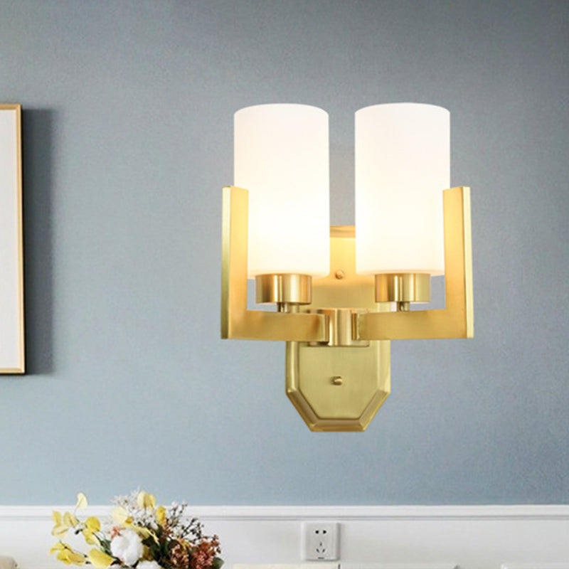 Modernist 2 Heads Sconce Light Gold Cylinder Wall Mounted Lamp with Milk Glass Shade Clearhalo 'Cast Iron' 'Glass' 'Industrial' 'Modern wall lights' 'Modern' 'Tiffany' 'Traditional wall lights' 'Wall Lamps & Sconces' 'Wall Lights' Lighting' 331079