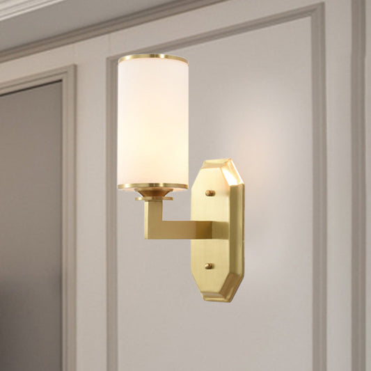 Modernism Cylindrical Sconce Light Opal Glass 1 Bulb Wall Lighting Fixture in Gold with Metal Arm Clearhalo 'Cast Iron' 'Glass' 'Industrial' 'Modern wall lights' 'Modern' 'Tiffany' 'Traditional wall lights' 'Wall Lamps & Sconces' 'Wall Lights' Lighting' 331084