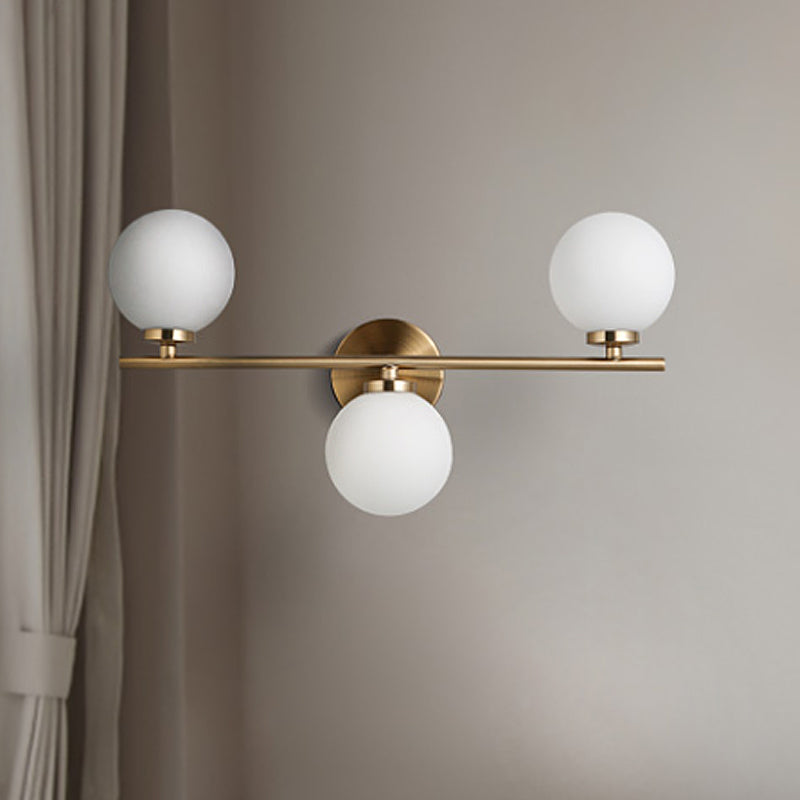 Modernism 3 Heads Sconce Gold Round Wall Mounted Lighting with Milky Glass Shade Clearhalo 'Cast Iron' 'Glass' 'Industrial' 'Modern wall lights' 'Modern' 'Tiffany' 'Traditional wall lights' 'Wall Lamps & Sconces' 'Wall Lights' Lighting' 331122