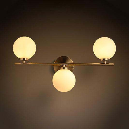 Modernism 3 Heads Sconce Gold Round Wall Mounted Lighting with Milky Glass Shade Clearhalo 'Cast Iron' 'Glass' 'Industrial' 'Modern wall lights' 'Modern' 'Tiffany' 'Traditional wall lights' 'Wall Lamps & Sconces' 'Wall Lights' Lighting' 331123