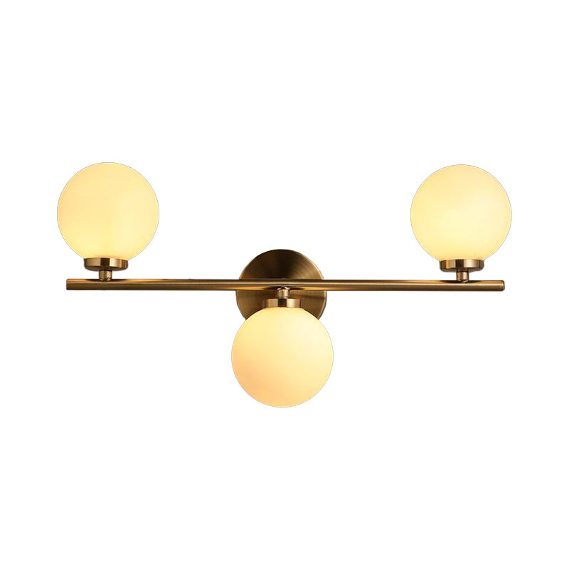 Modernism 3 Heads Sconce Gold Round Wall Mounted Lighting with Milky Glass Shade Clearhalo 'Cast Iron' 'Glass' 'Industrial' 'Modern wall lights' 'Modern' 'Tiffany' 'Traditional wall lights' 'Wall Lamps & Sconces' 'Wall Lights' Lighting' 331124