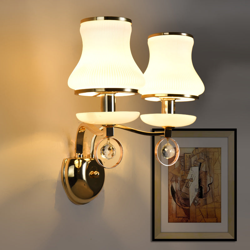 White Glass Flared Sconce Light Modernist 2 Bulbs Wall Mounted Lighting in Gold with Metal Arm Clearhalo 'Cast Iron' 'Glass' 'Industrial' 'Modern wall lights' 'Modern' 'Tiffany' 'Traditional wall lights' 'Wall Lamps & Sconces' 'Wall Lights' Lighting' 331127